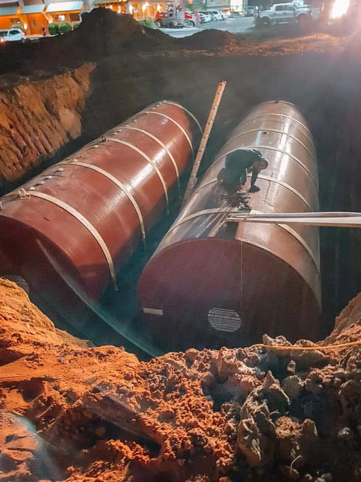 Underground storage tanks in an excavation during installation